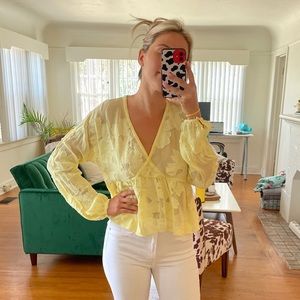 Beautiful pastel yellow blouse. Fits like a small!